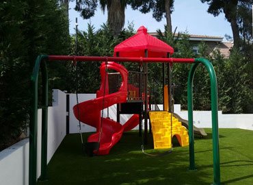 Play structure with swingset